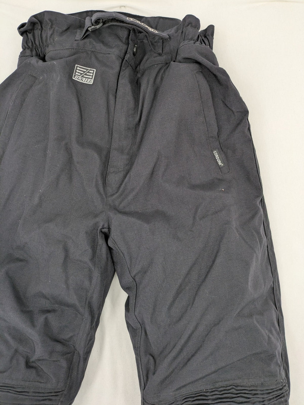 Aero black chaps Cordura fabric with ribbed knee inserts and adjustable waistband.