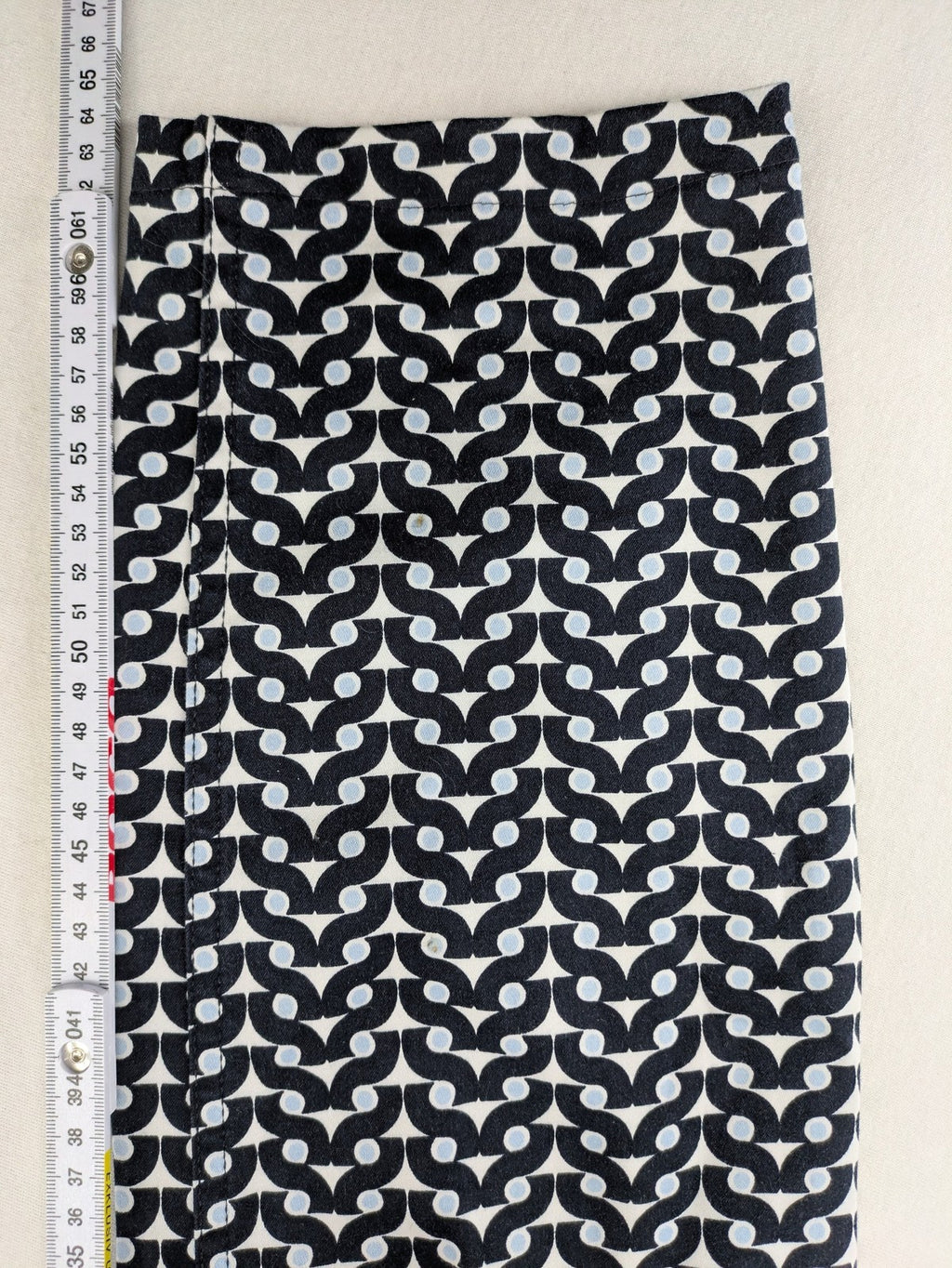 Bonita navy pants with geometric pattern, stretch material, and classic zip fly closure.