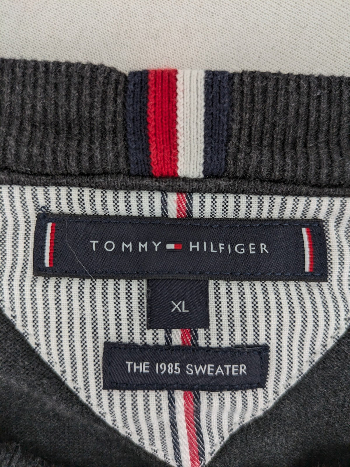Tommy Hilfiger grey turtle neck jumper with embroidered flag logo on chest.