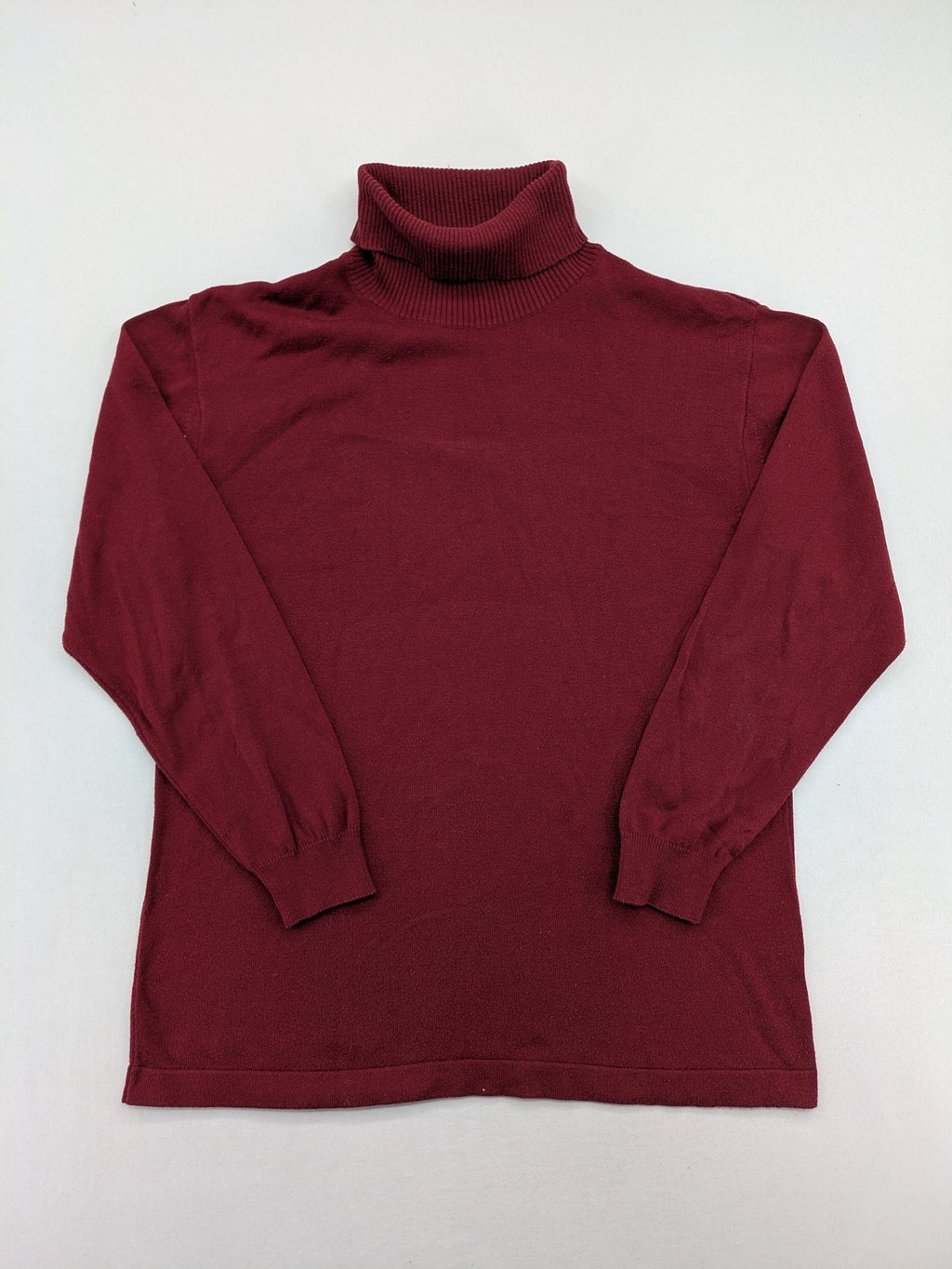 Les Corps burgundy turtle neck jumper with ribbed details and soft cotton blend material.