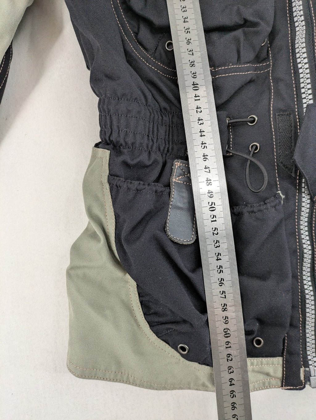 Polo multi biker jacket nylon with adjustable fit and multiple pockets.