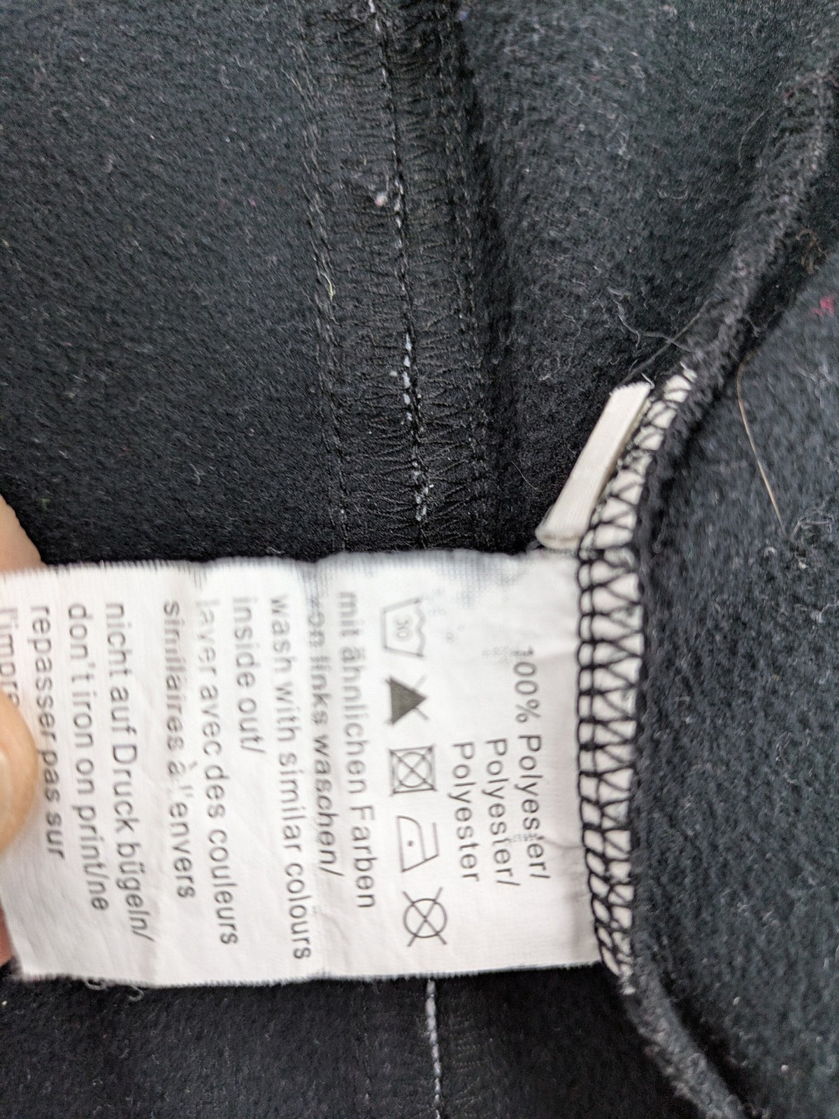 Spalding black training jacket with orange and white accents, Rasta Vechta logo, zip front.