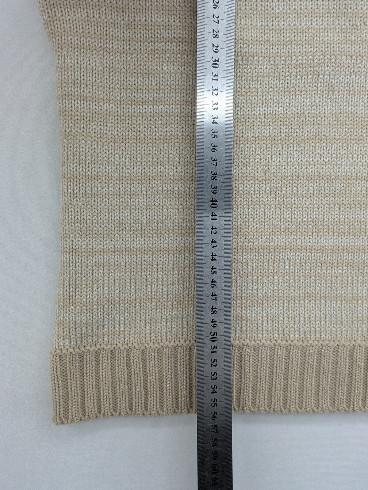 Pencini beige turtle neck jumper, sleeveless design, soft merino wool blend.
