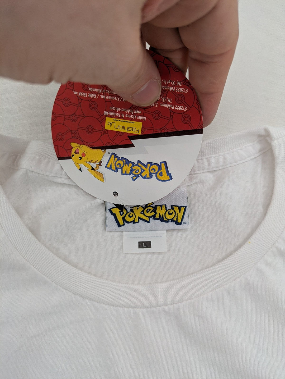 Pokémon multi T-shirt featuring comic graphic of Pikachu, Glurak, Turtok, and Bisaflor.