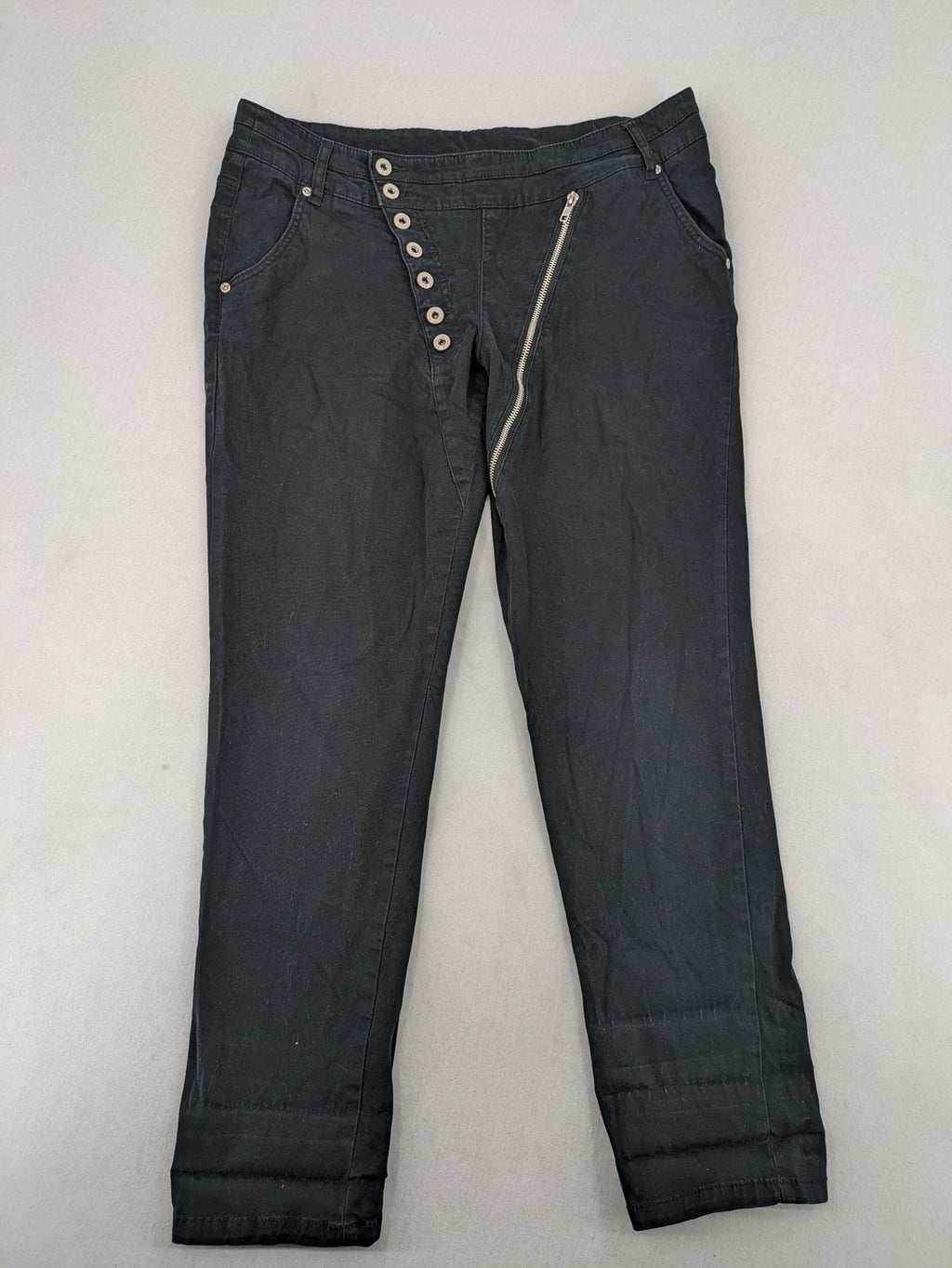 REI grey pants asymmetrical design with diagonal zipper and button placket, cotton blend.
