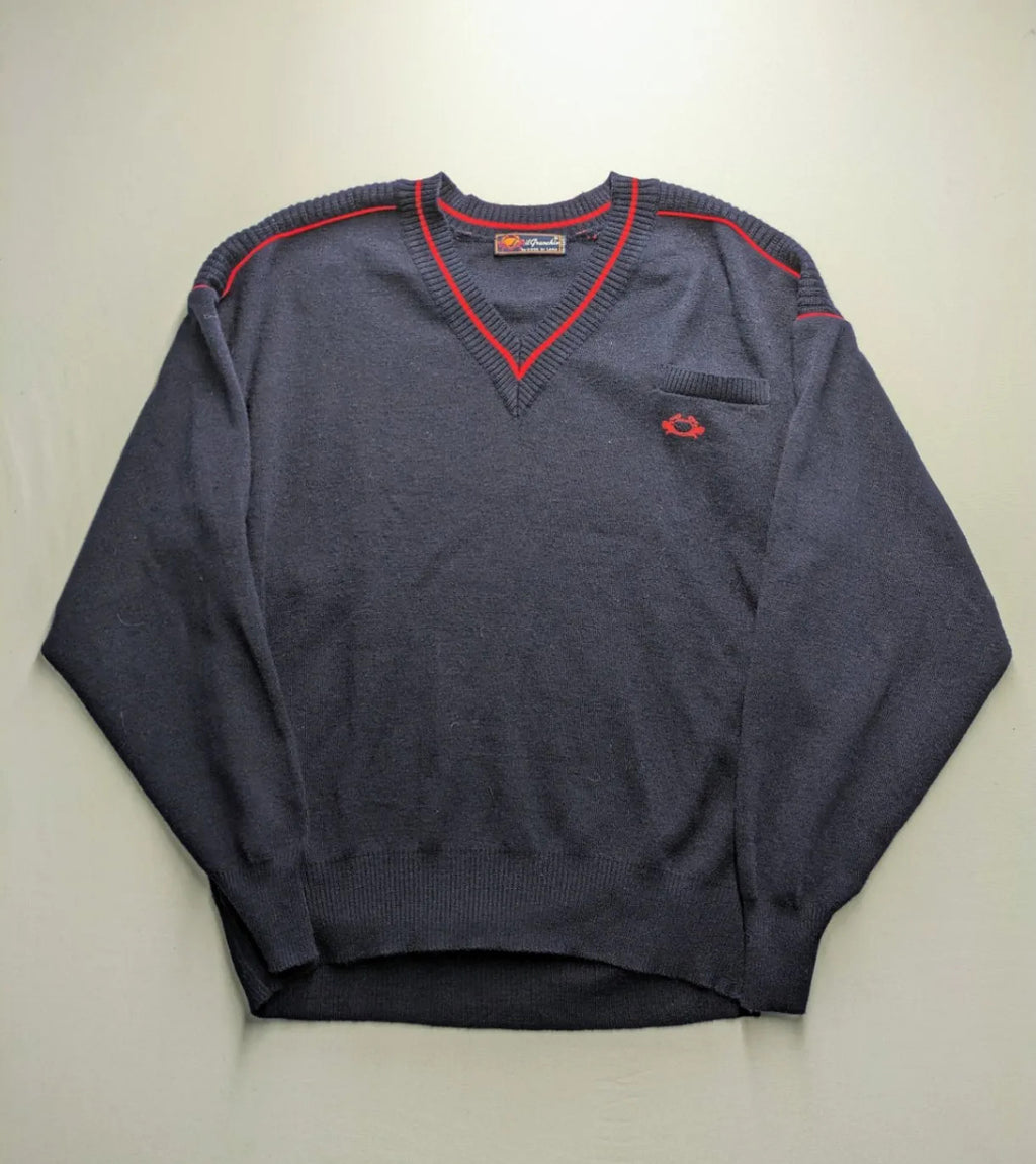 Il Granchio grey turtle neck jumper with red accents and embroidered crab logo.