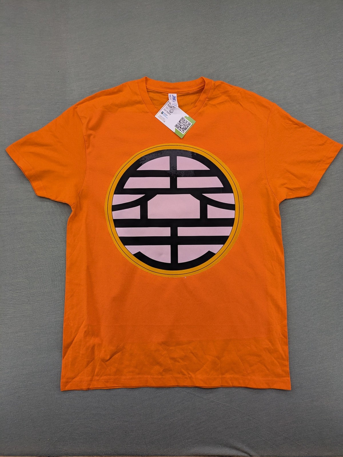 Dragon Ball Z orange t-shirt featuring 'Go' kanji symbol, made of soft cotton.