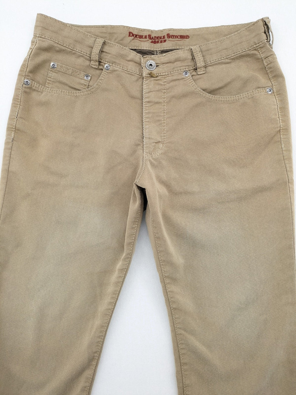 Joker beige straight jeans with double saddle stitching and classic 5-pocket design.
