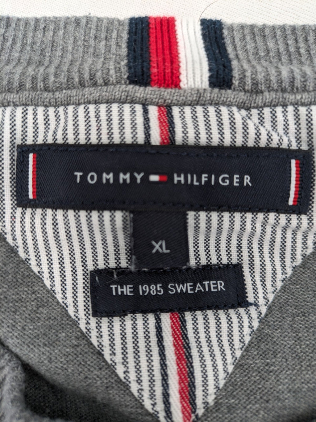 Tommy Hilfiger grey turtle neck jumper with embroidered flag logo, soft cotton blend.