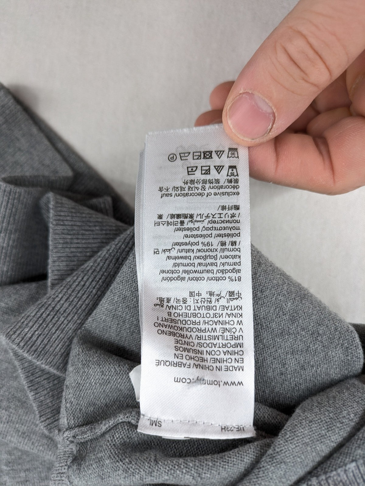 Tommy Hilfiger grey turtle neck jumper with embroidered flag logo, soft cotton blend.