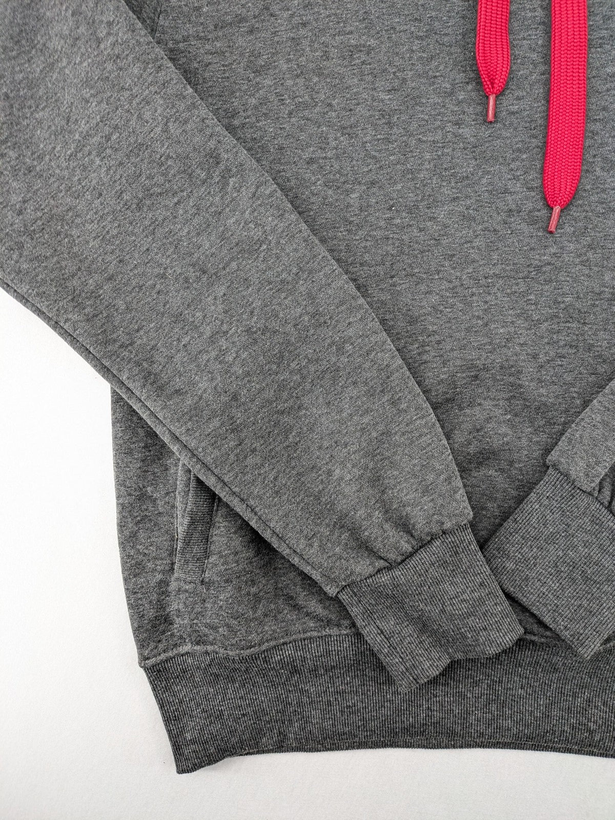 Bolf grey hoodie with pink contrast hood, kangaroo pocket, and ribbed cuffs.