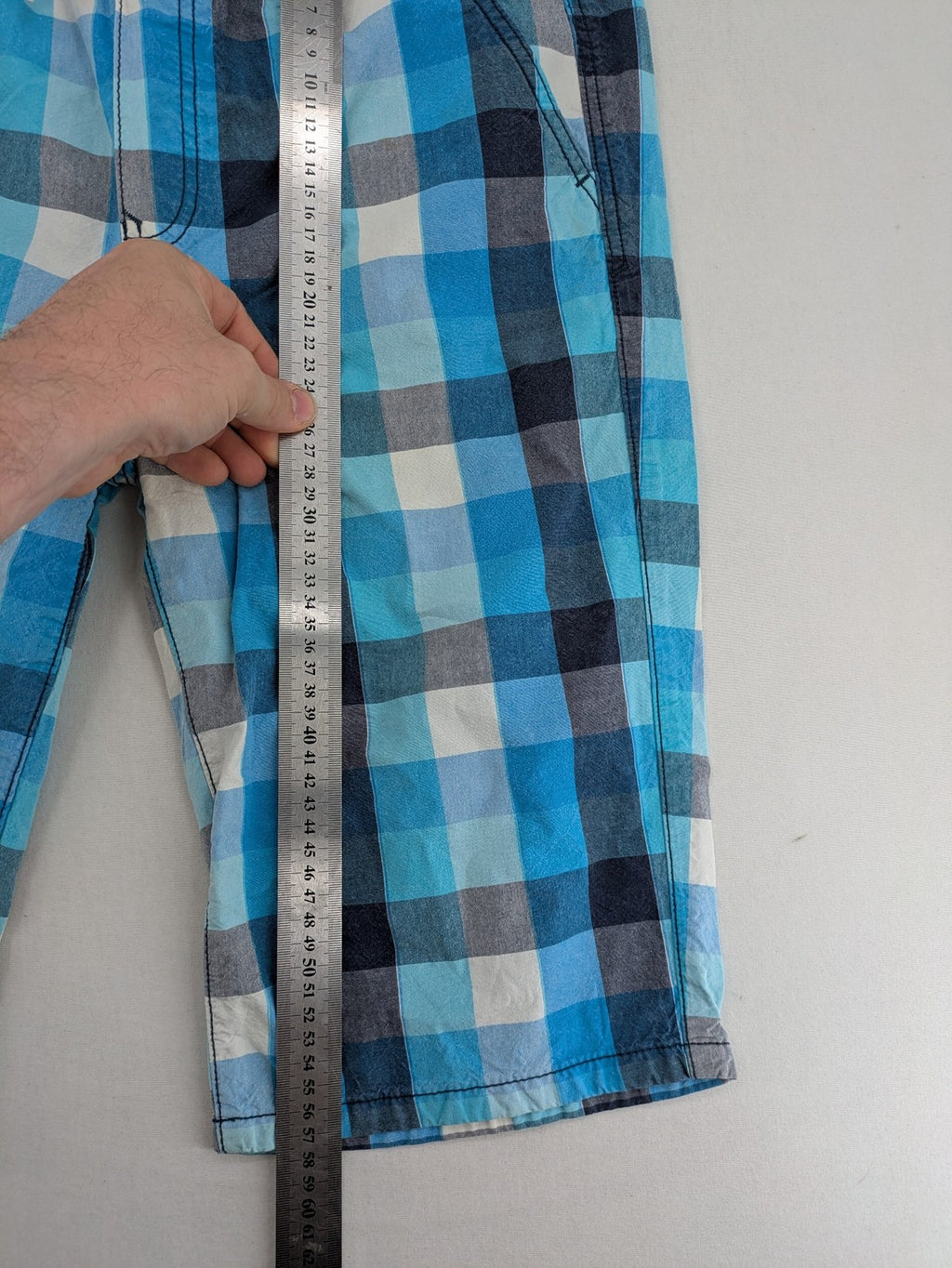 C&A blue checkered shorts with elastic waistband and side pockets, Skate Nation style.