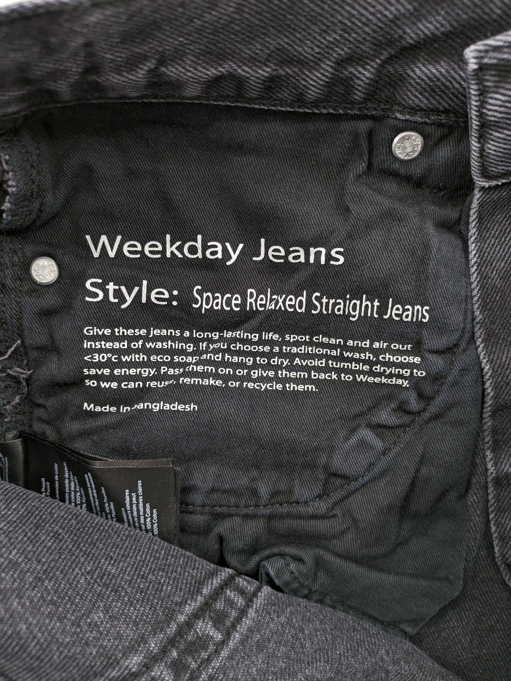 Weekday grey straight jeans with button fly and classic denim design.