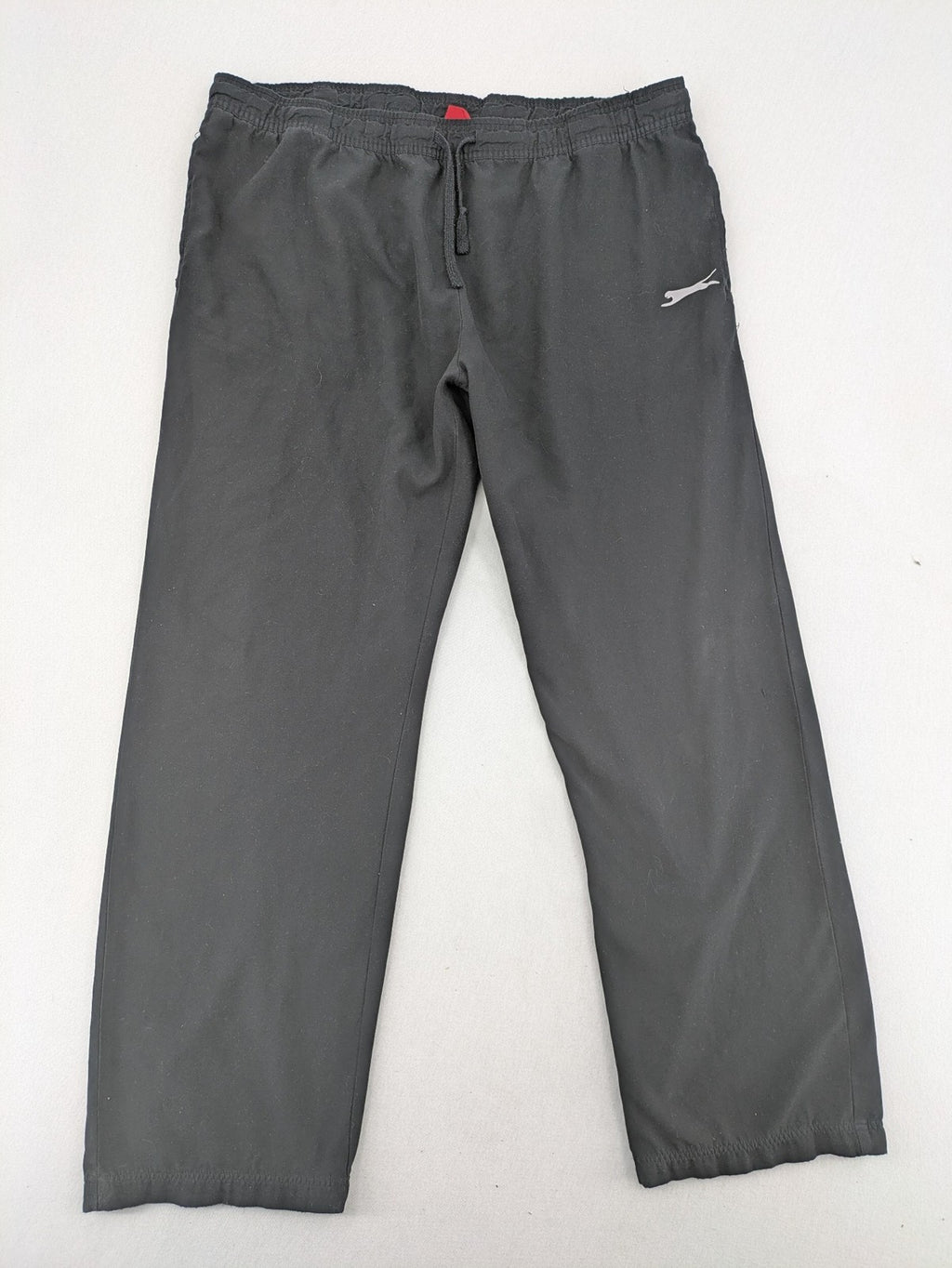 Slazenger grey loungewear joggers with adjustable drawstring and subtle logo on thigh.