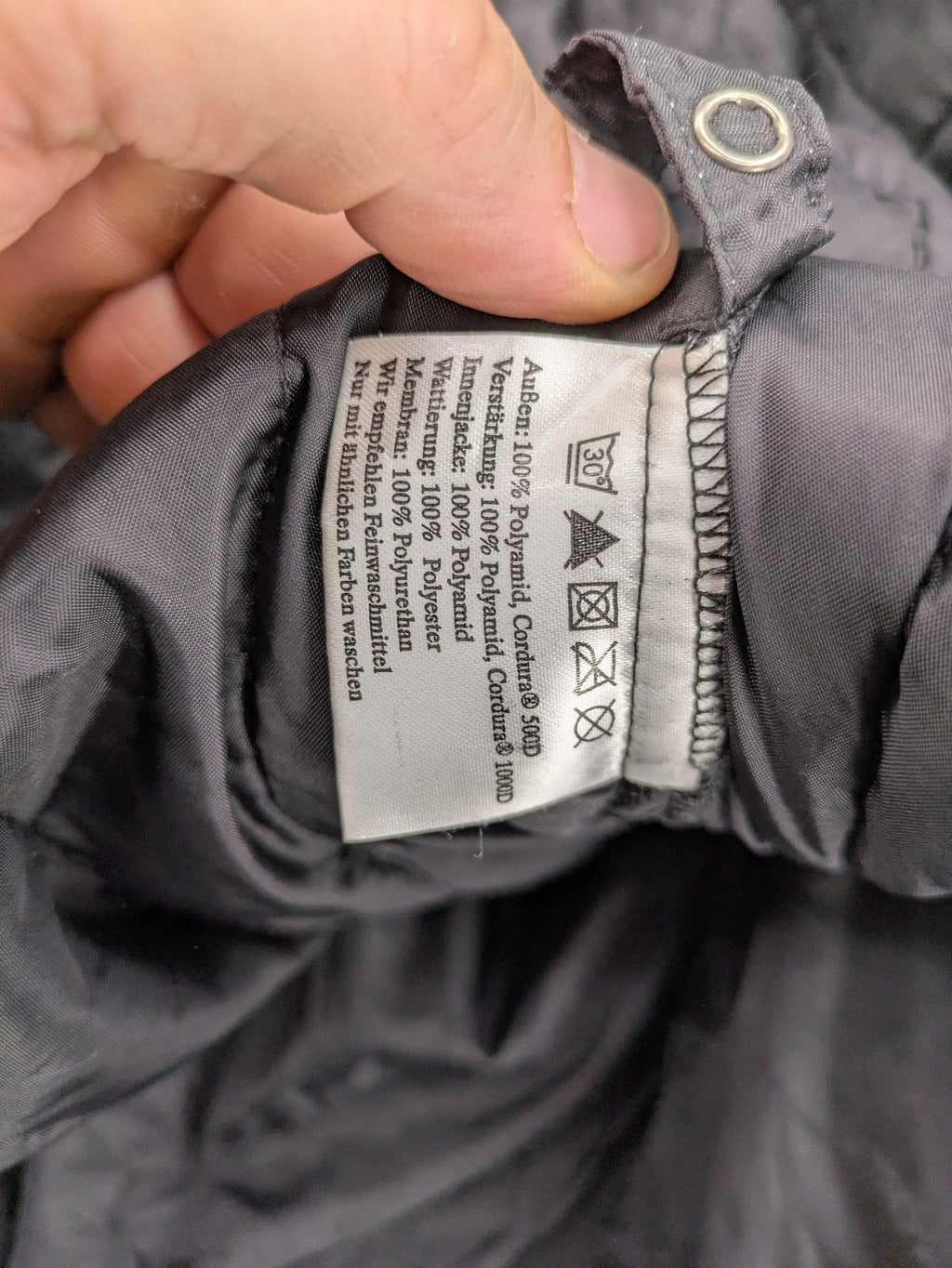 Advanced Experience black motorcycle jacket with Z-Liner membrane and CE protectors, durable Cordura material.