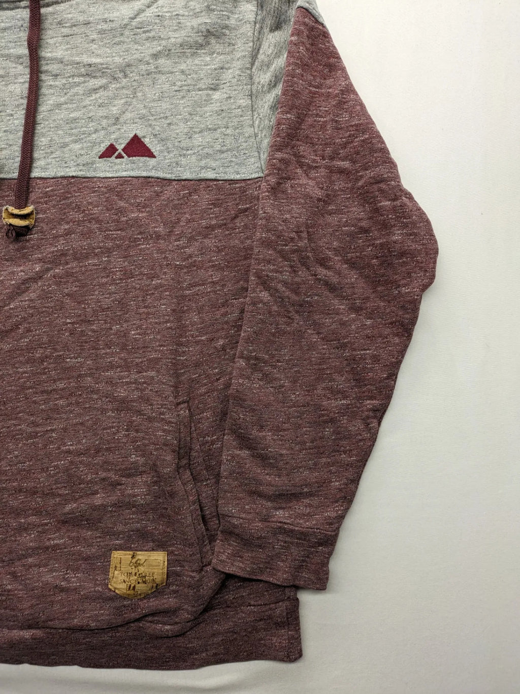 Bleed turtle neck jumper grey burgundy colorblock design with adjustable hood and kangaroo pocket.