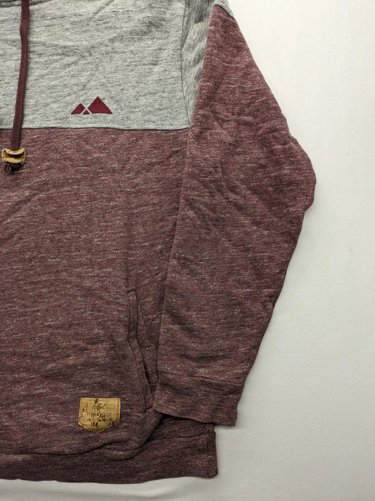 Bleed turtle neck jumper grey burgundy colorblock design with adjustable hood and kangaroo pocket.