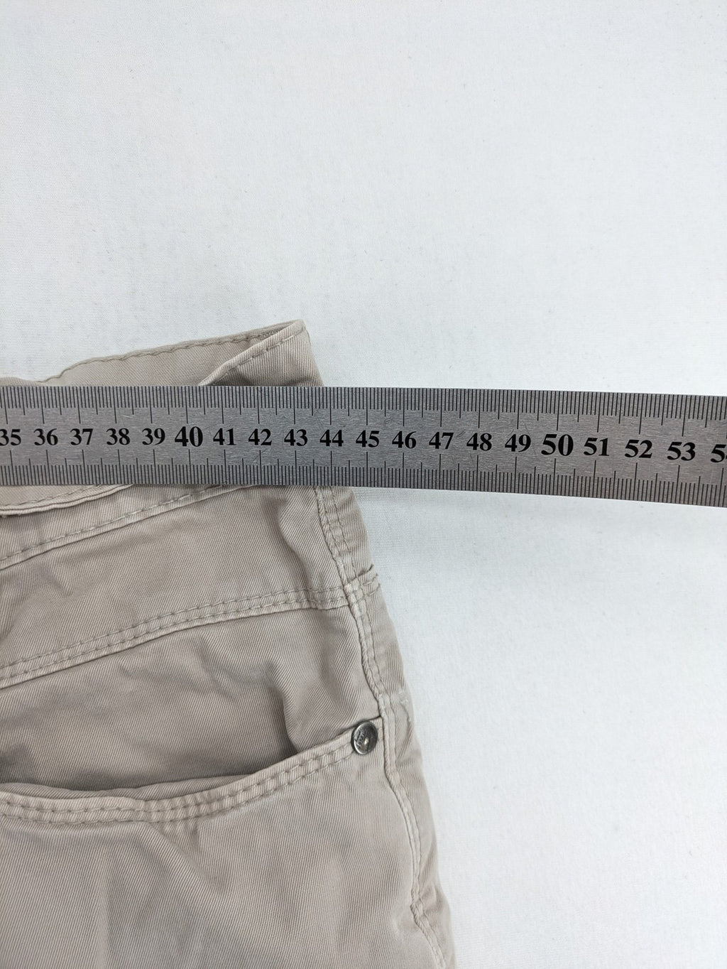 Joker beige chino pants 5-pocket design made from cotton stretch blend.
