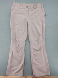 Hickory beige outdoor pants with multiple zippered pockets and stretch fabric for comfort.