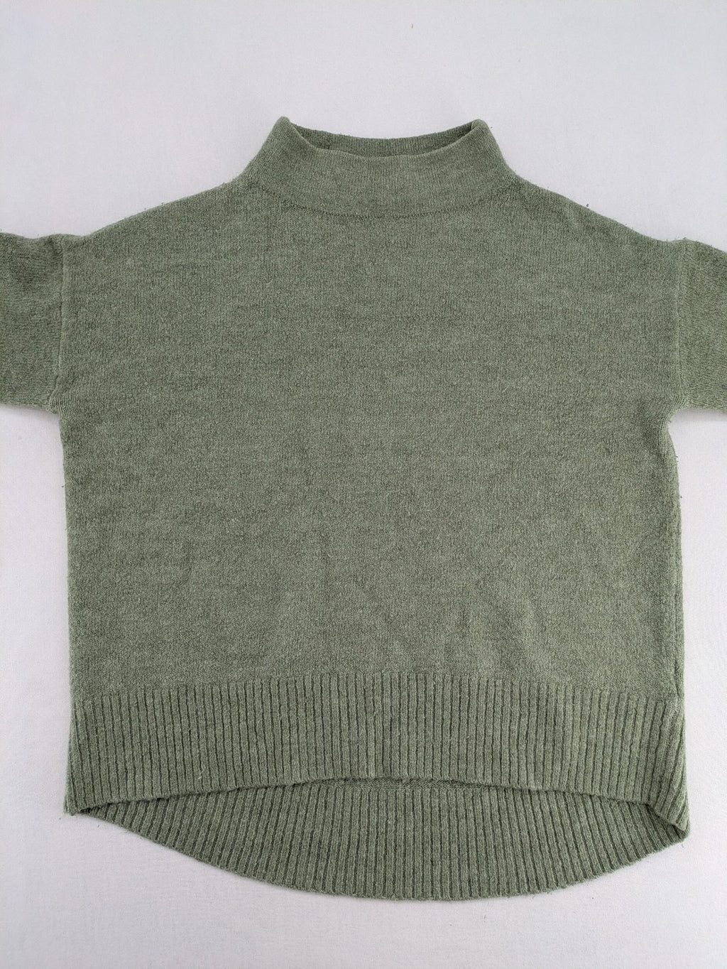 up2 fashion green turtle neck jumper soft knit high-low hem with side slits
