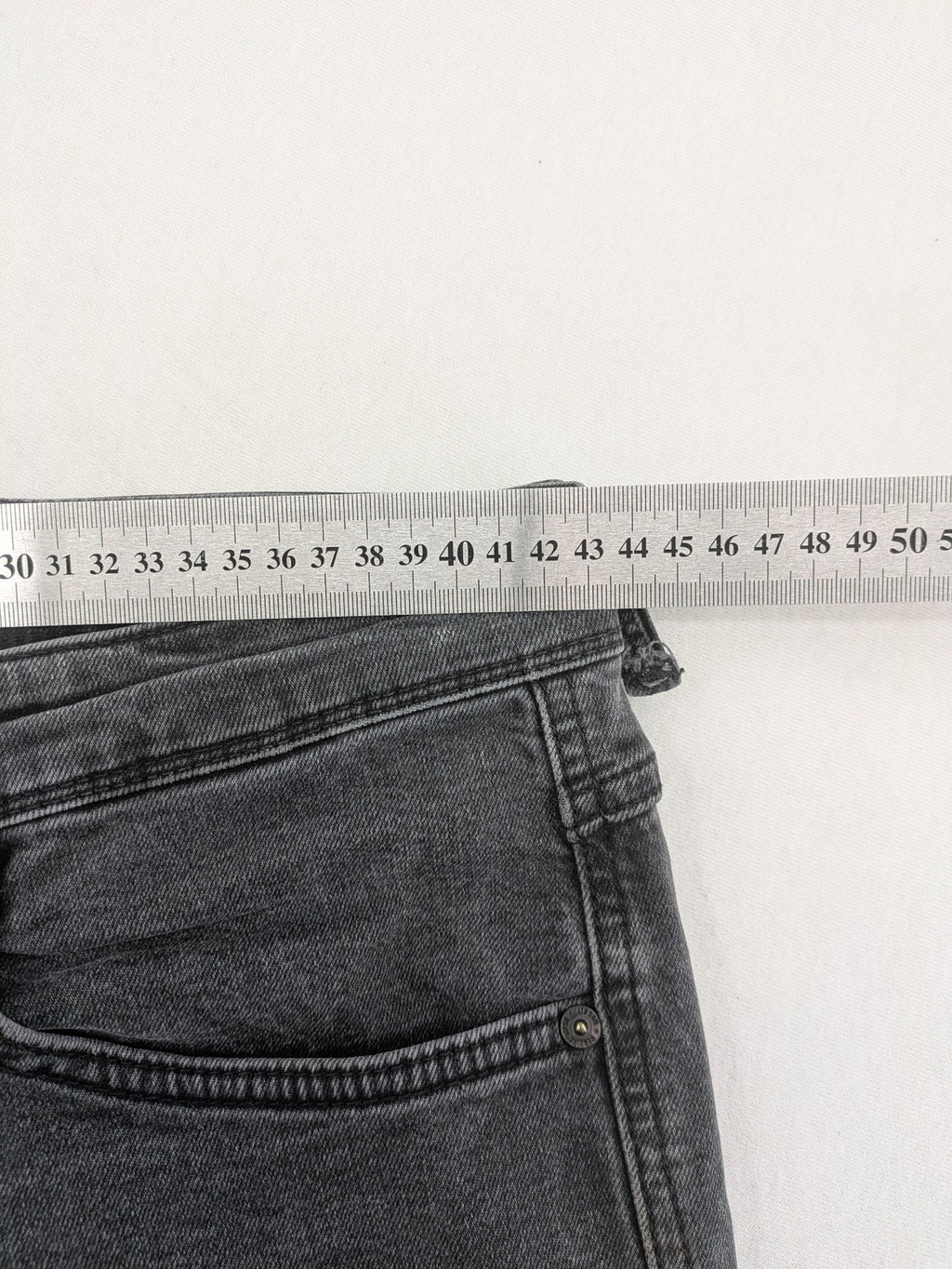 LTB grey slim tapered jeans with washed denim finish and subtle logo detail.