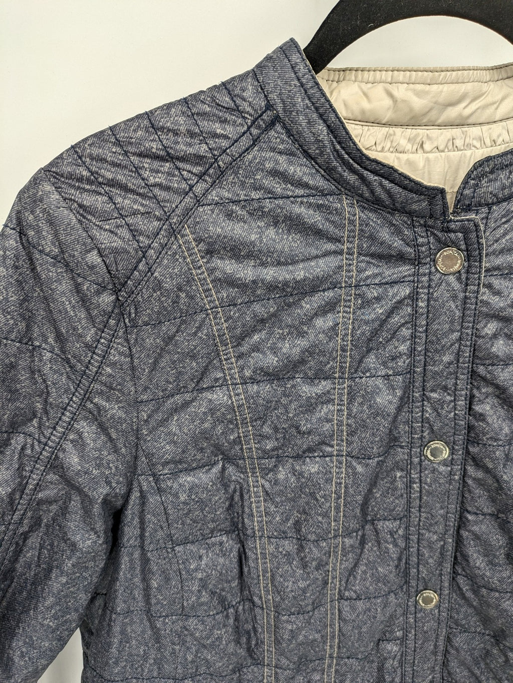 Bonita reversible jacket beige and blue, textured fabric, snap button closure.