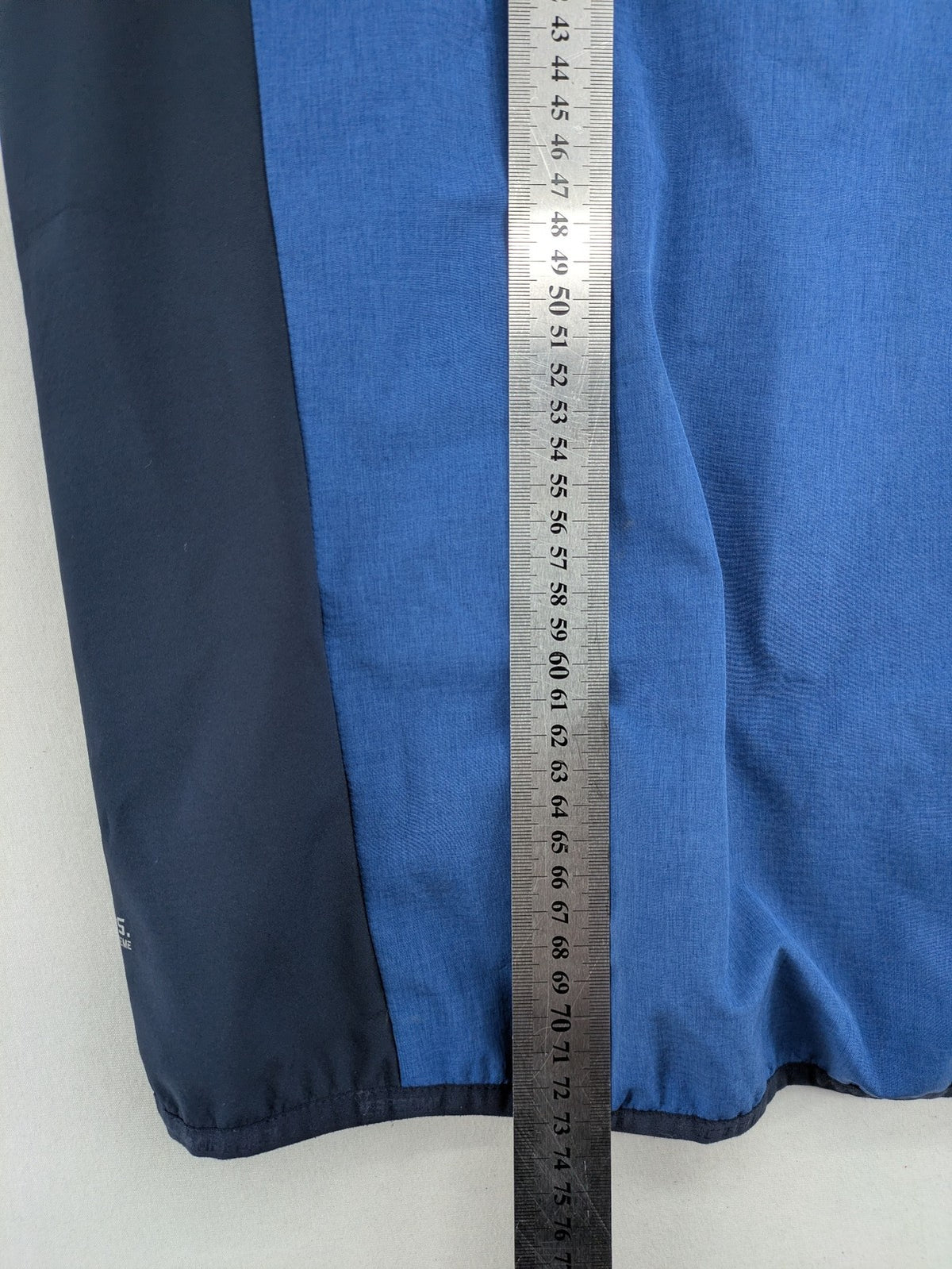 Icepeak blue softshell jacket colorblock design with zip pockets and logo details.