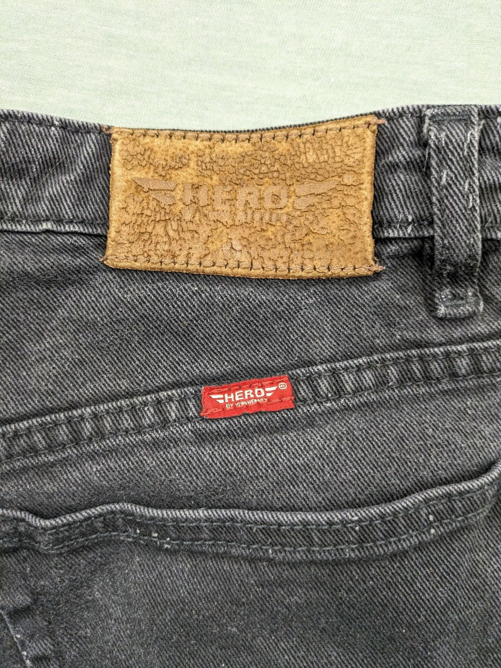 Hero by John Meddox black straight jeans with faded wash and durable cotton-stretch material.