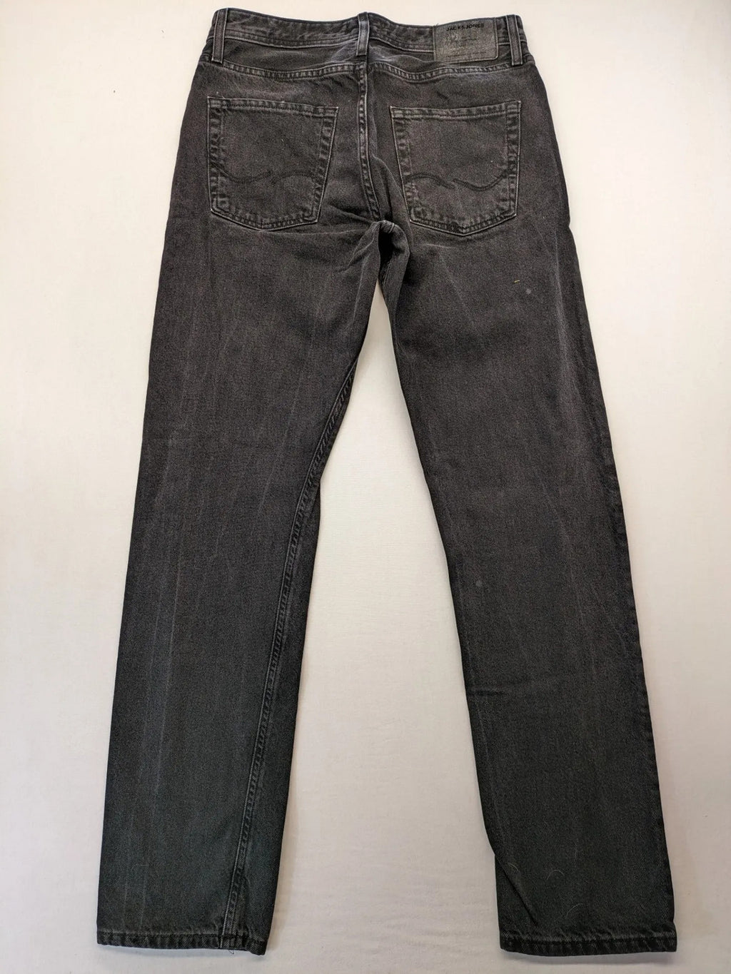 Jack & Jones grey loose fit jeans with classic button fly and 5-pocket design.