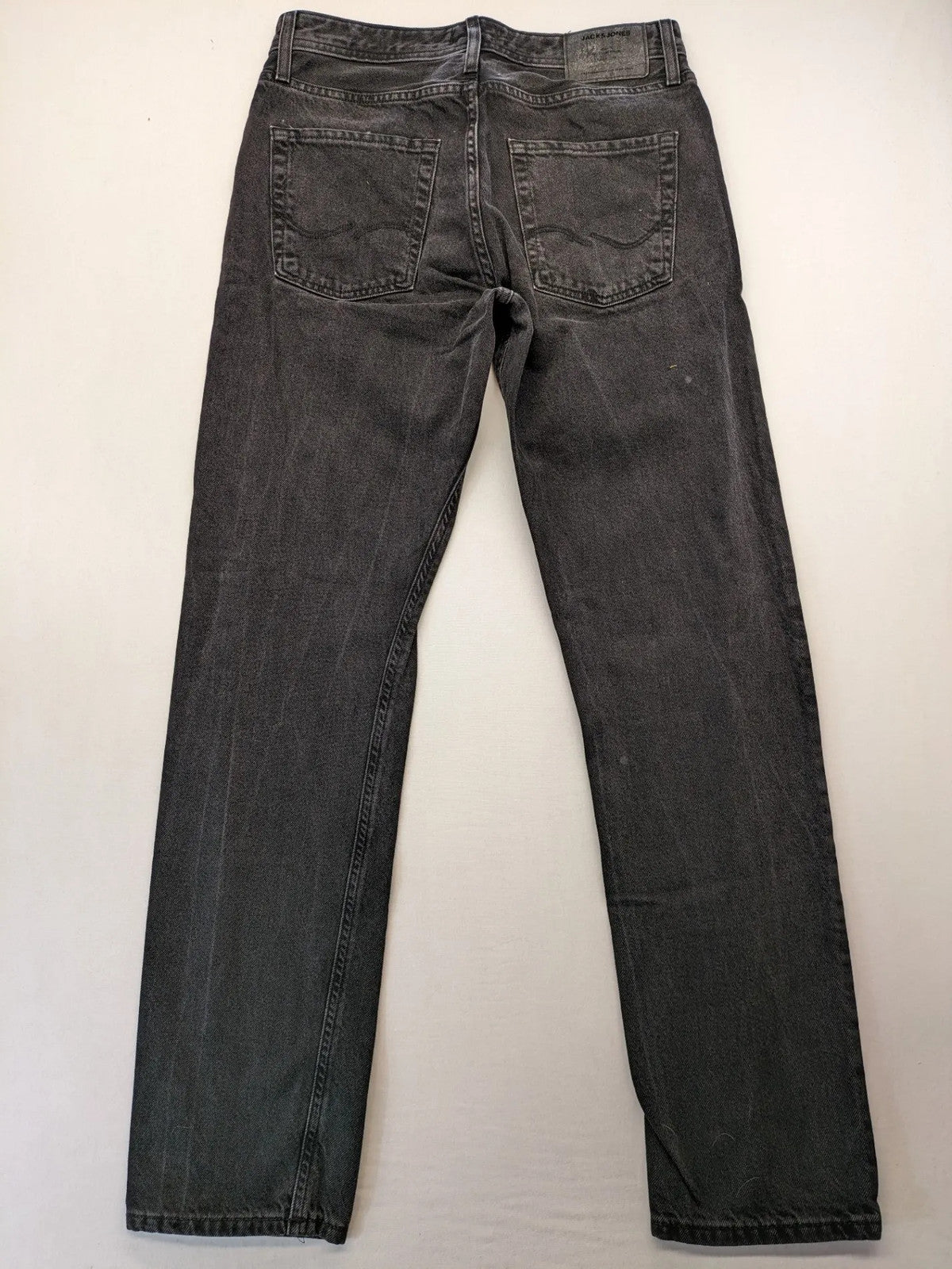 Jack & Jones grey loose fit jeans with classic button fly and 5-pocket design.