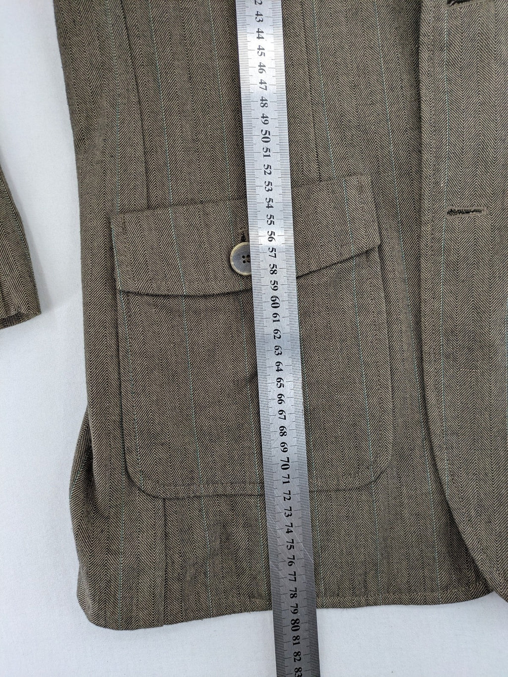 Springfield pink blazer with subtle pinstripe pattern and patch pockets.
