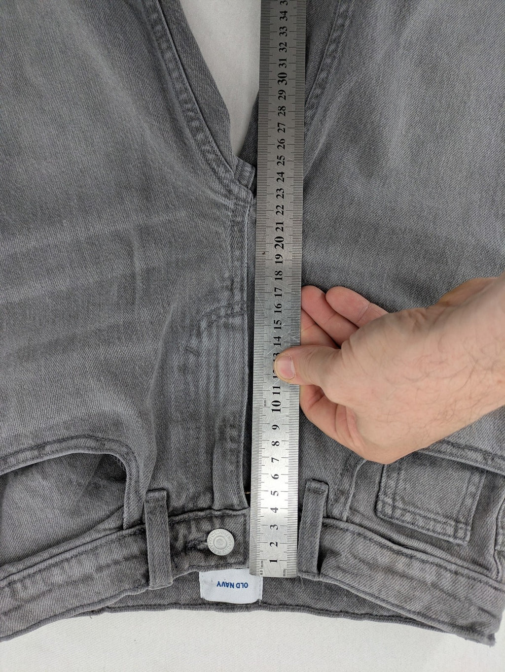 Old Navy navy straight jeans with adjustable waistband and classic 5-pocket design.