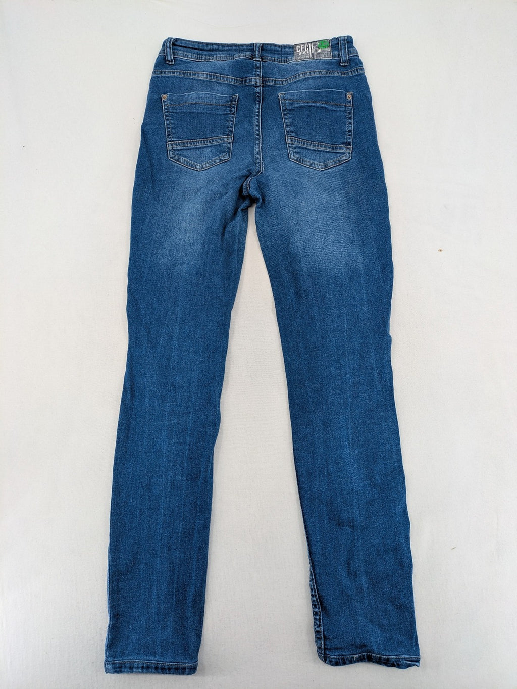 Cecil blue straight jeans with neon green accents and classic 5-pocket design.