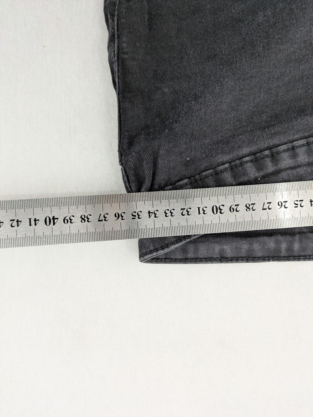 Denim & Co. black skinny jeans high waist stretch denim with washed finish.