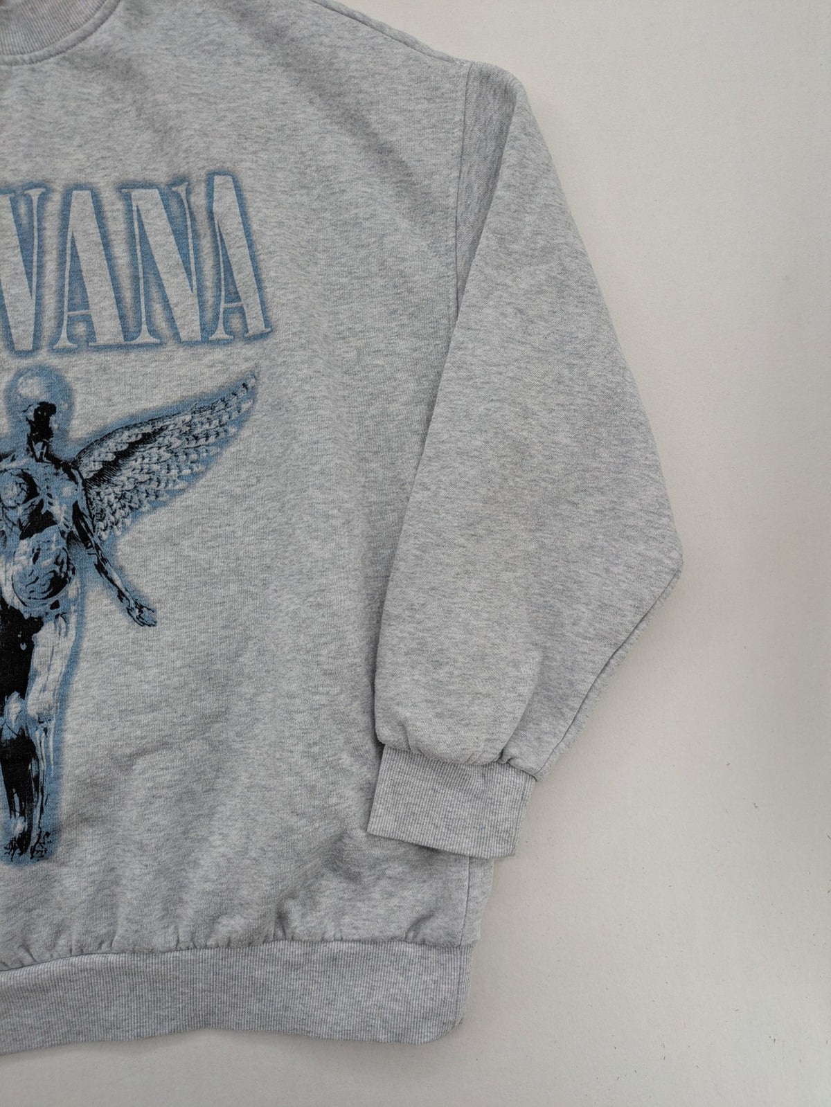 H&M Divided grey turtle neck jumper featuring Nirvana "In Utero" angel graphic.
