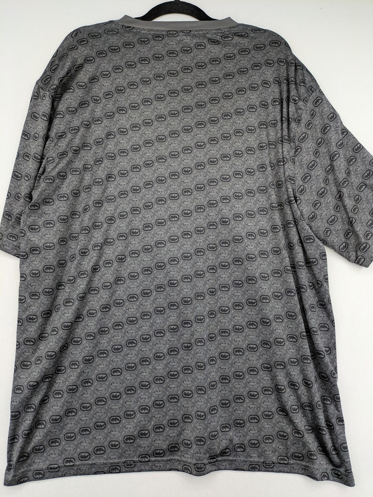Ecko Unltd. grey soccer uniform V-neck with all-over logo print and embroidered FC patch.