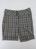 Lindex grey checkered bermuda shorts with red accents, high waist, decorative button detail.