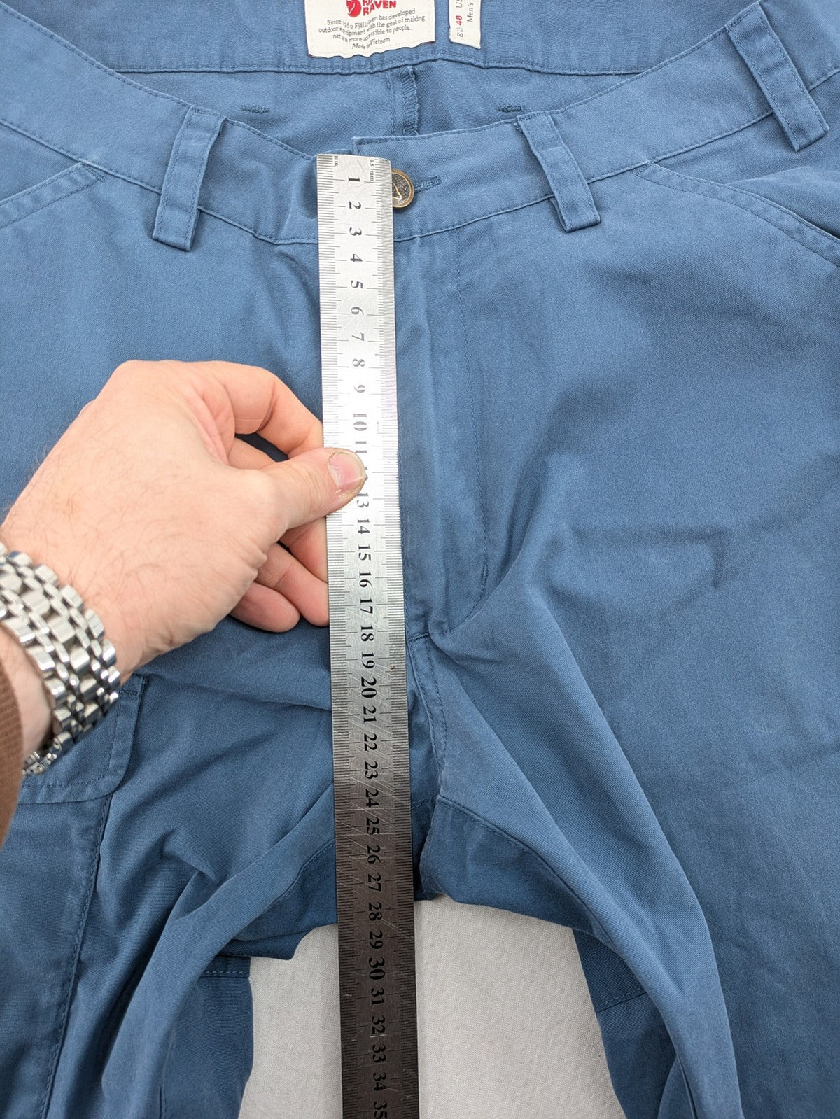 Fjällräven blue trousers G-1000 fabric, regular fit, mid waist, versatile for outdoor activities.