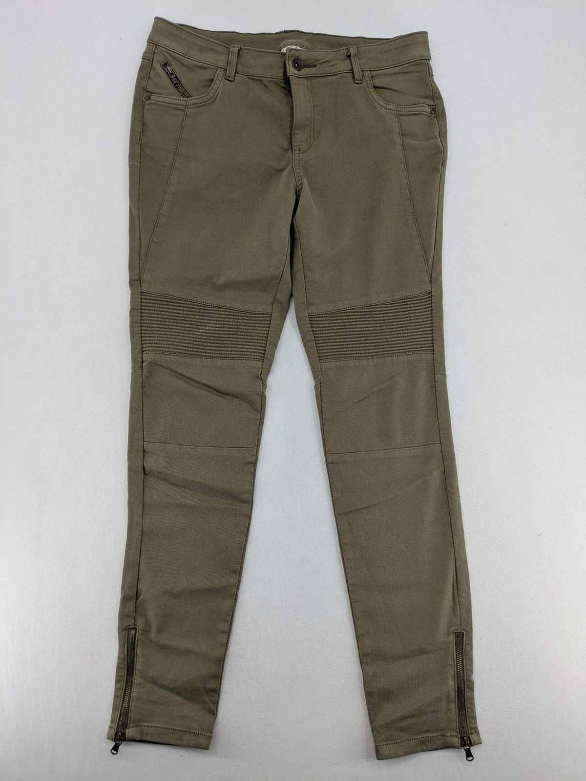 Clockhouse green moto jeggings with ribbed knee panels and ankle zippers.