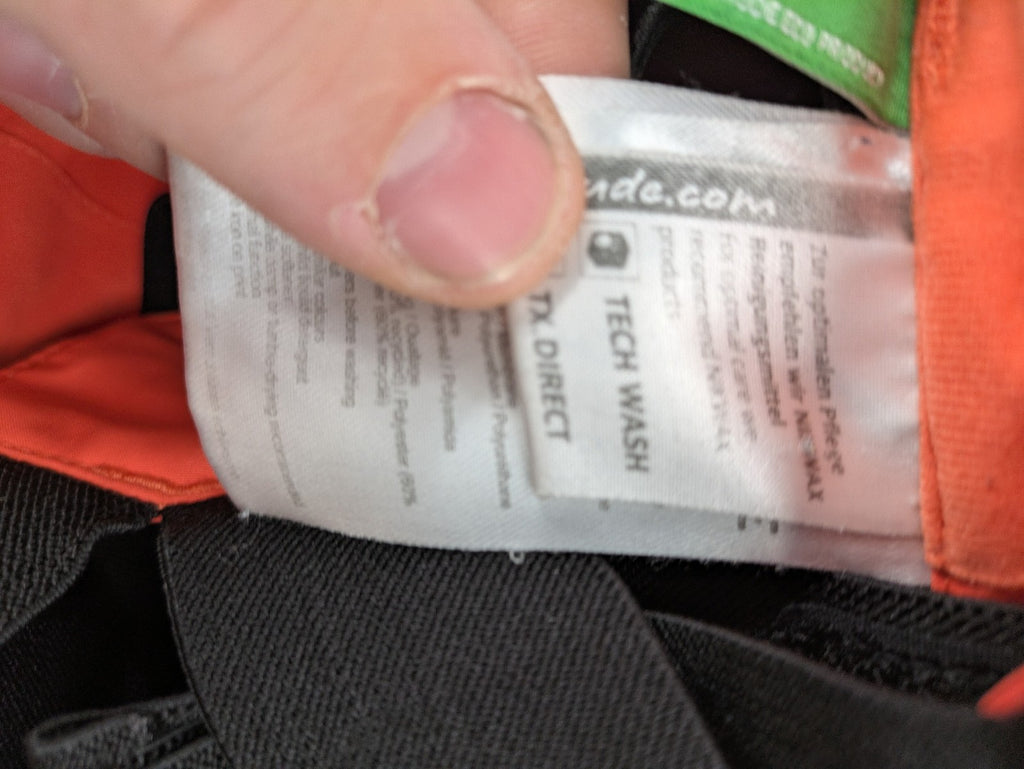Vaude orange ski pants with logo, Primaloft insulation, and Ceplex Active membrane.
