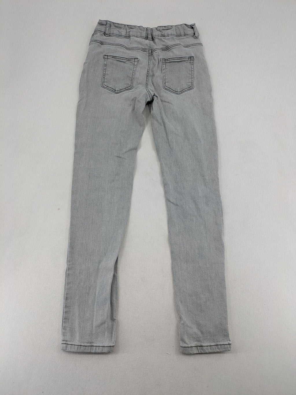 C&A grey skinny jeans for girls, soft stretch denim, classic fit, versatile wash.
