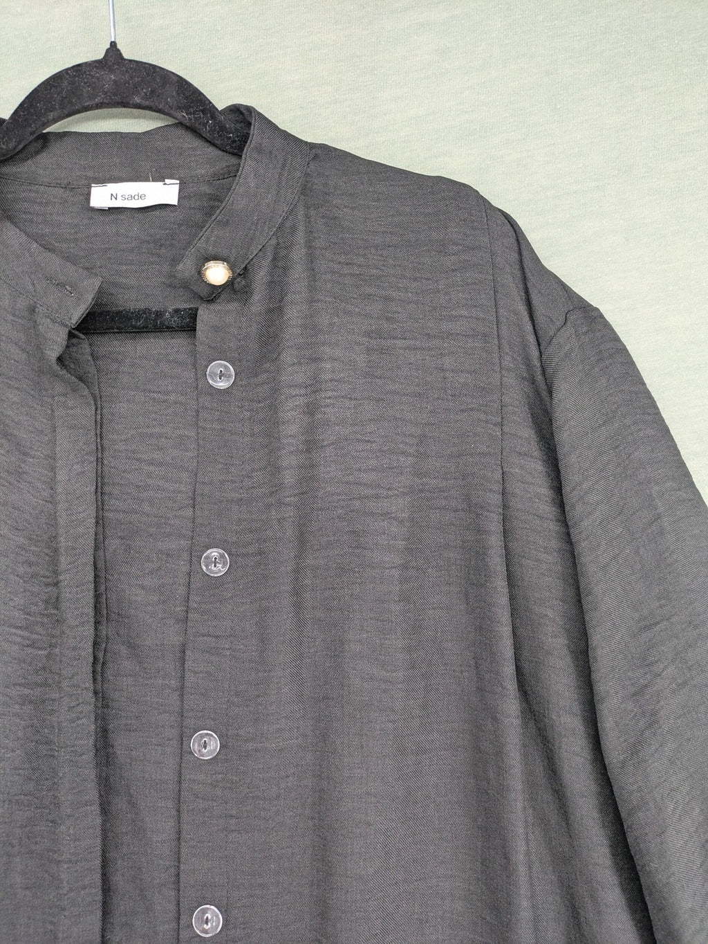 Damen grey turtle neck jumper with balloon sleeves and side ties, high-low hem.