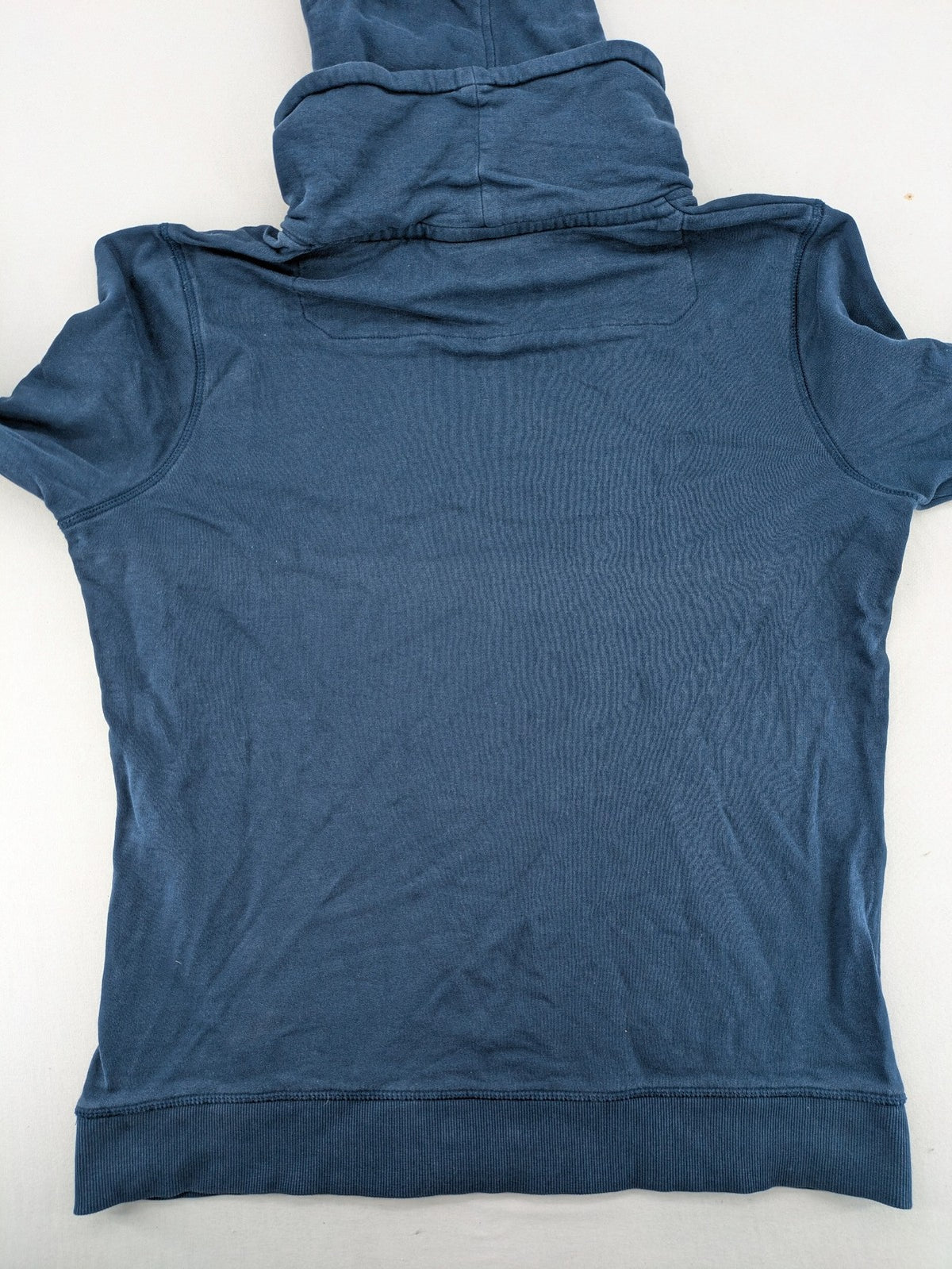 Jack & Jones Core blue hoodie with large gold "C" graphic and high collar.