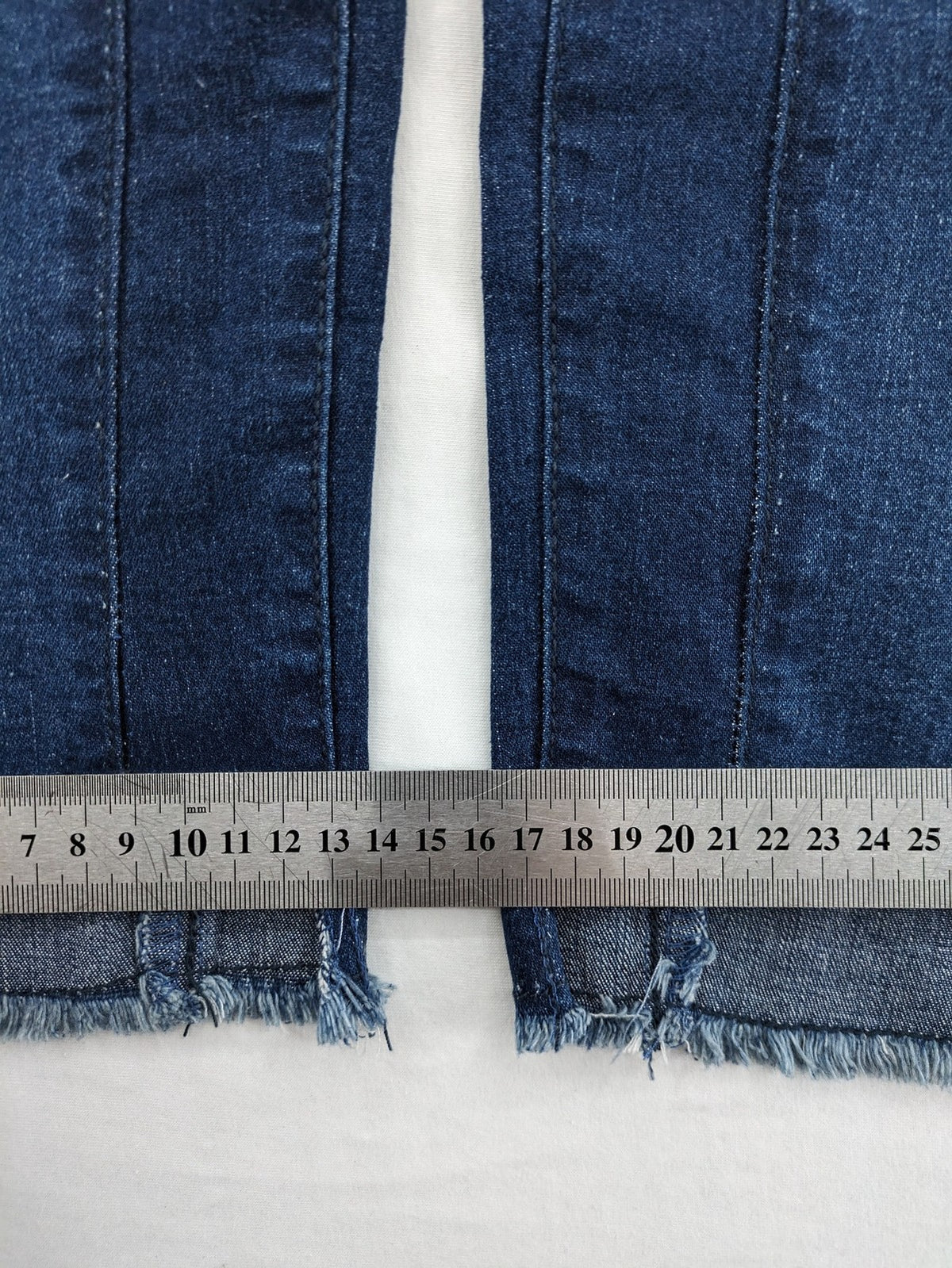 Best Connections blue skinny jeans with frayed hem and sporty side stripe.