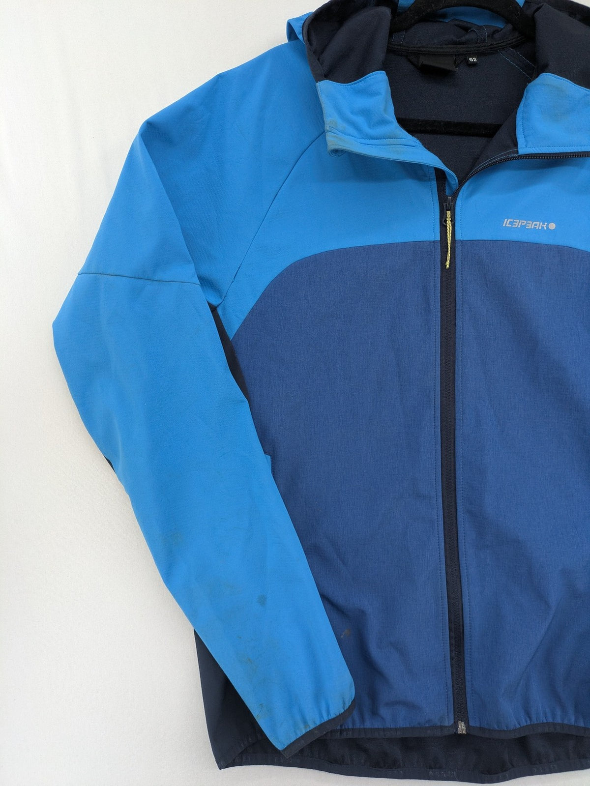 Icepeak blue softshell jacket colorblock design with zip pockets and logo details.