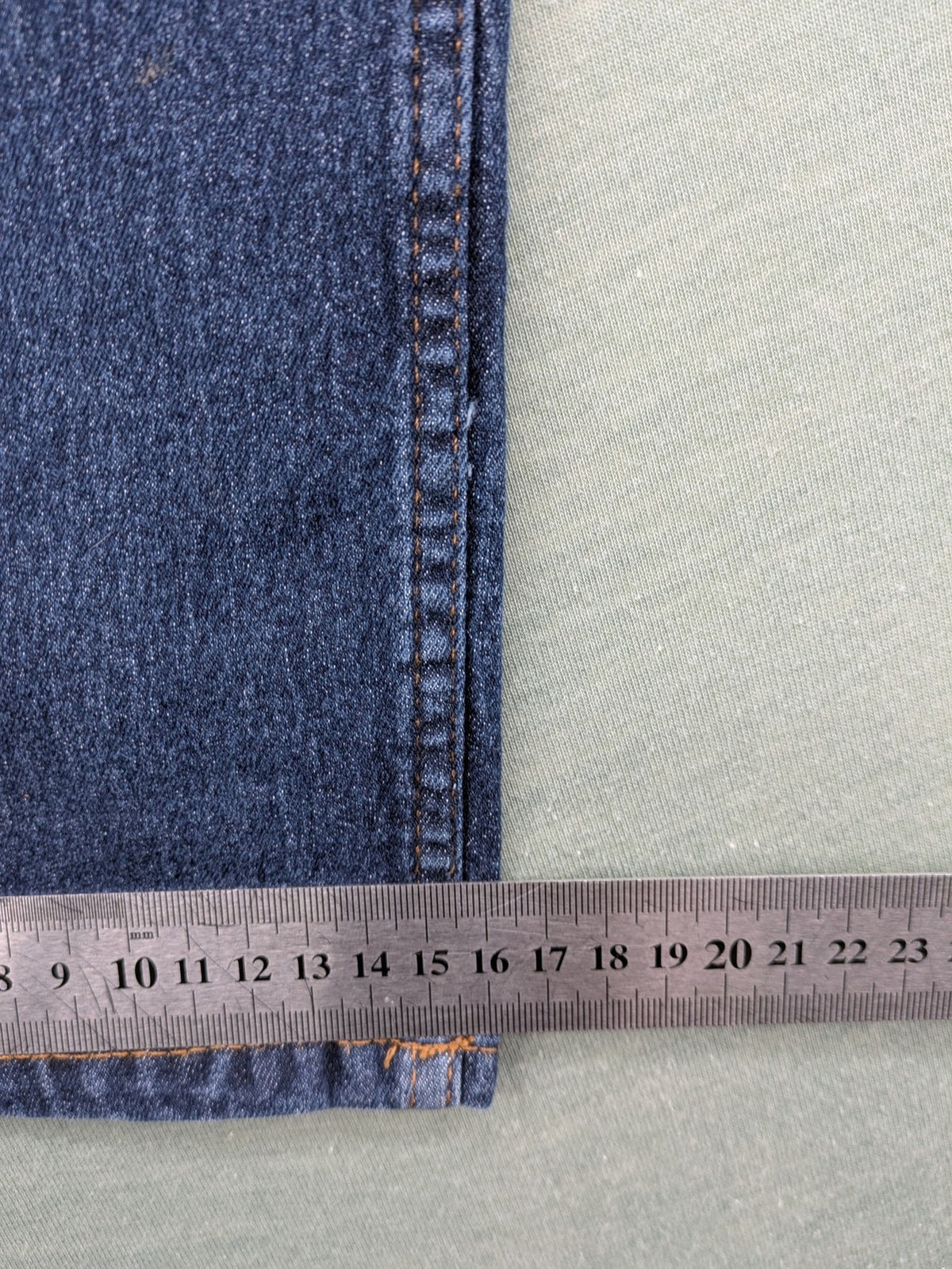 H&M blue straight jeans with adjustable waistband and classic 5-pocket design.