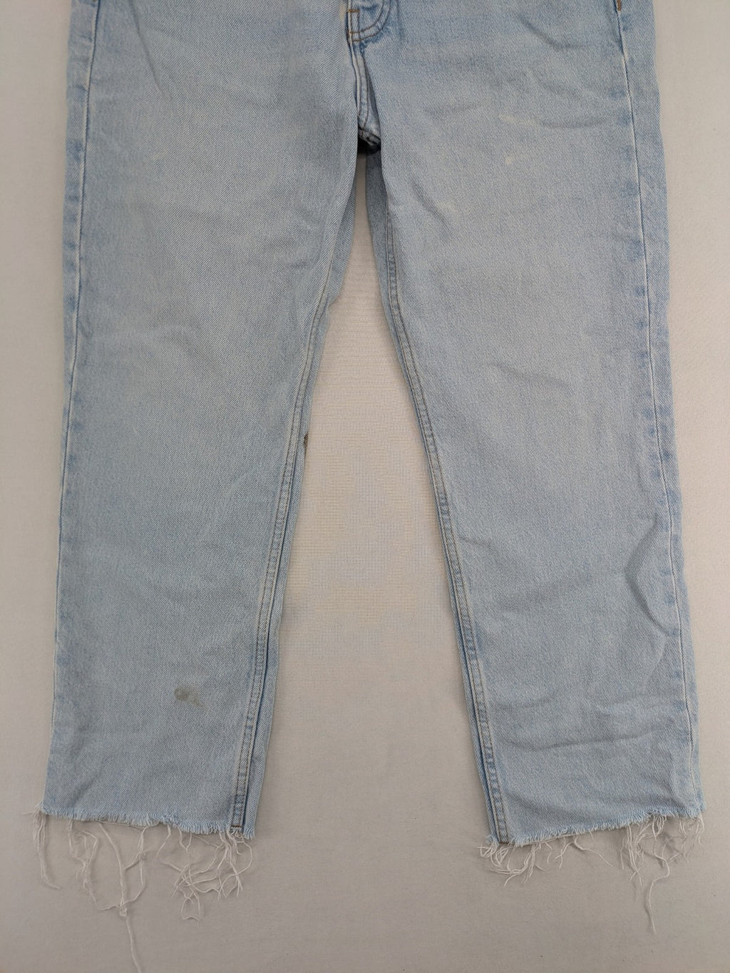MNG blue high waist mom jeans with raw hem and five-pocket style.