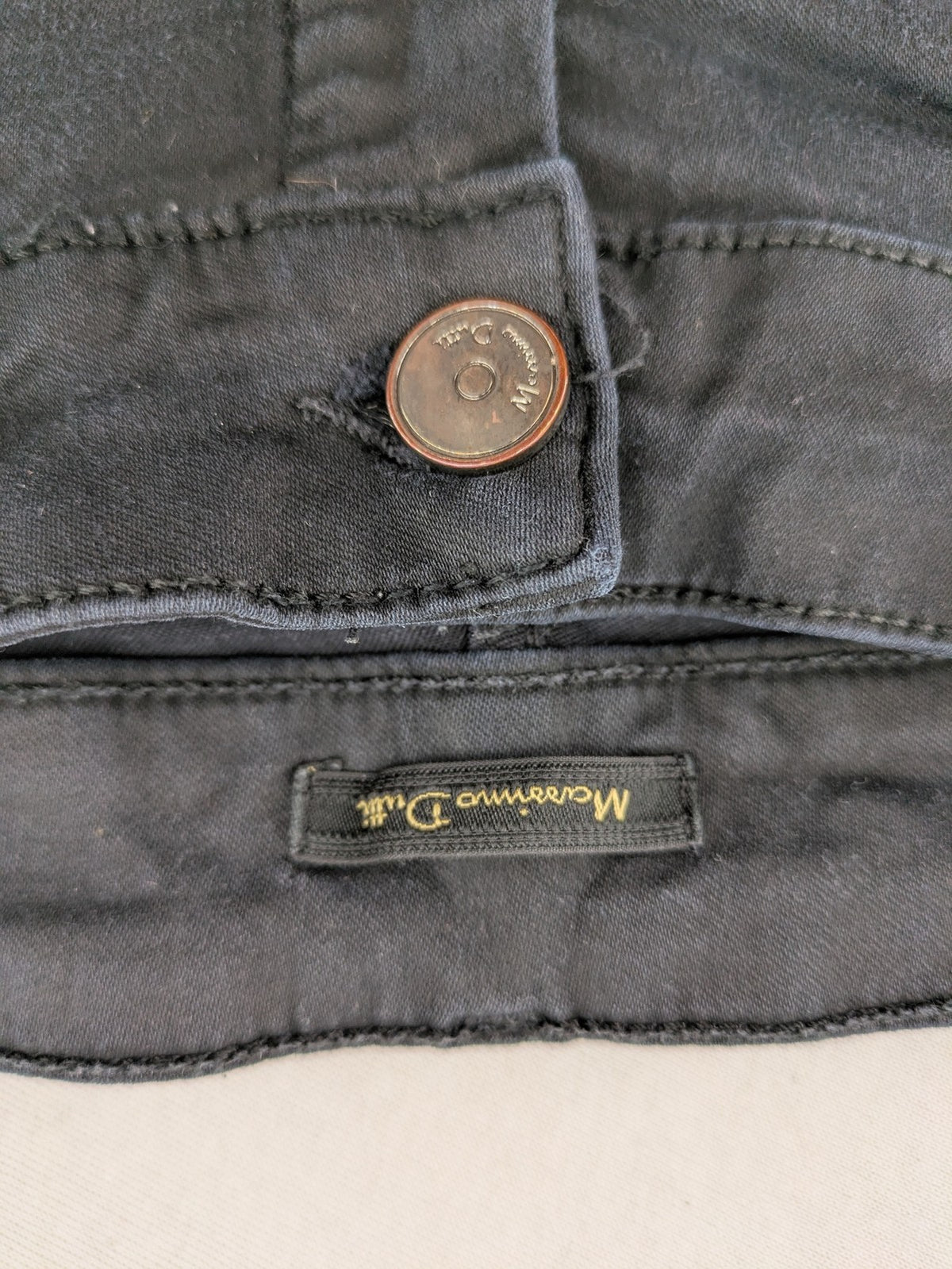 Massimo Dutti grey skinny fit jeans with coated finish and sleek silhouette.