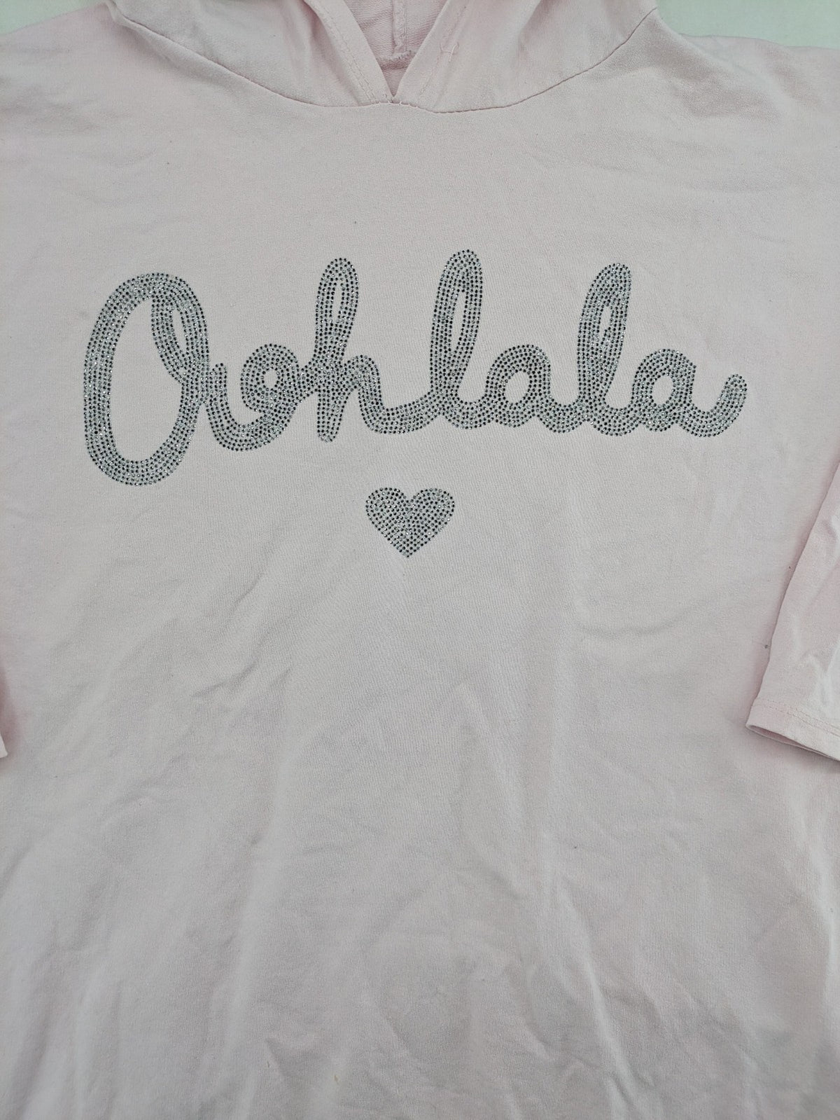 Irie pink turtle neck jumper with "Oohlala" rhinestone lettering and logo drawstrings.