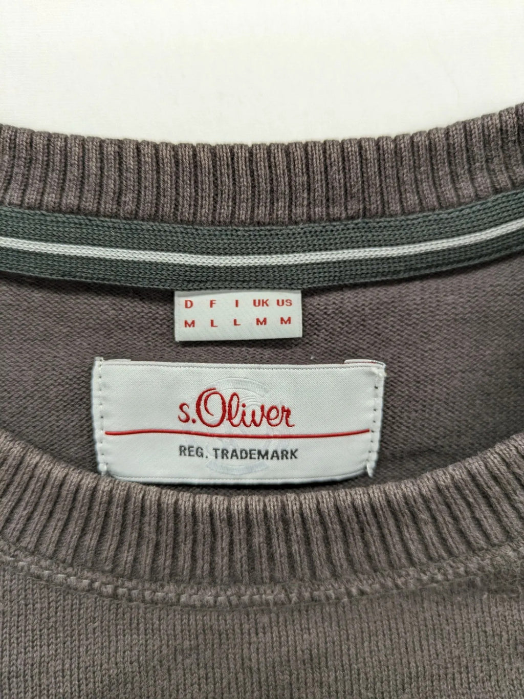 s.Oliver brown turtle neck jumper with "Radford Inc." graphic print and ribbed cuffs.